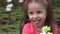 Adorable Toddler Girl With Flowers