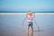 Adorable toddler girl on the sand beach at Atlantic coast of Brittany  France