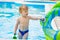 Adorable toddler in the swimming pool