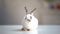 Adorable white bunny sitting at vet clinic table, animal vaccination and care