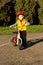 Adorable young boy posing with his bicycle