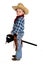 Adorable young cowboy riding a stick horse werious