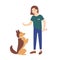 Adorable young woman dressed in casual clothes holding treat and training her dog to obey commands. Cute girl teaching