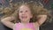 Adorable youngster with long beautiful hair can\'t stop laughing, hilarious