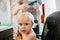 Adorably Precious Cute Little Blond Toddler Boy with Long Hair  Getting His First Hair Cut