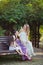 Adoring Brunette blond chestnut blue eyes sisters girls wearing cosy night white purple dress enjoying lifetime together summer su