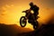 Adrenaline pumping motocross Silhouette with front wheel lifted, action packed adventure