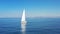 Adriatic Sea, Croatia - 10.04.2021: Aerial view of sailing luxury yacht at opened sea at sunny day in Croatia