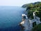 Adriatic sea in Italy.  rocky coast.  stairs leading to the sea.  blue sea water.  panorama.  high cliffs above the sea.
