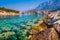 Adriatic sea shore with small leisure boats inside the harbor of Makarska City