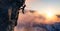 Adult adventurous man Rock Climbing a steep rocky cliff.