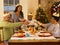 Adult African American family having dinner