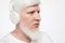 Adult albino man with headphones