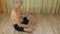 Adult bald man sitting on floor, meditating in lotus yoga pose, concentrating in silence, observing breath, relaxing