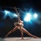 Adult ballerina posing on stage in theater