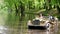 Adult couple on a relaxing date on pedalo in park