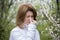 Adult female with allergic rhinitis about cherry blossoms