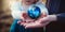 Adult hands holding a little globe and passing it to a baby girl. Earth prototype in the human hands. Generative AI