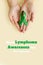 Adult hands holds green ribbon on beige background. World lymphoma awareness day. September 15. Liver, Gallbladders bile