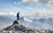 Adult Hiker Male standing on top of a rocky mountain