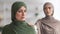 Adult Islamic Daughter Comforting Unhappy Senior Mother Posing Indoors, Panorama