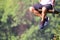 Adult legs sitting on swing  loneliness playing in the park