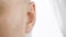 Adult male ear close up. Man moving his ear. Otolaryngology and hearing health