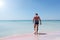 Adult male on the pink sand beach at Elafonisi on the island of
