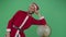 Adult Man Santa Claus Posing On A Globe