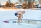 Adult man swimming cold water