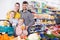 Adult parents with two girls choosing fruits