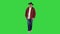 Adult smiling man in black cowboy hat walking on a Green Screen, Chroma Key.