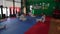Adult taekwondo training session in the gym, stretching, selective focus, 4K
