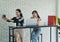 Adult Two women sipping coffee and chatting