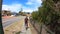 Adult woman cycling on bicycle path