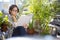 Adult woman enjoying leisure time at home. She is concentrated and relaxed reading a book