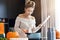 Adult woman in the kitchen preparing pumpkin dishes for Halloween