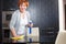 Adult woman washing glass table