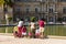 Adults and children relaxing in the Luxembourg Gardens. Paris, F