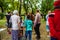 Adults and kids waiting in line for horse riding lessons in Targoviste, Romania, 2019