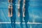 Adults legs underwater in the swimming pool