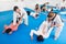 Adults practicing new taekwondo holds
