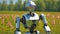 Advanced humanoid robot amid blooming flowers. Modern white android. Intersection of technology and ecology. Concept