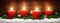 Advent decoration with four burning candles