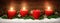 Advent decoration with three burning candles