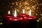 Advent theme with 4 burning red candles.