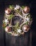 Advent wreath with Christmas deco and four candles