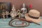 Adventure and archeological concept for lost artifacts with hat, whip, ancient iron vase, holy image, key of life, vintage crosses