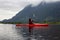 Adventure Caucasian Adult Woman Kayaking in Red Kayak