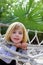 Adventure little girl on jungle park rope bridge